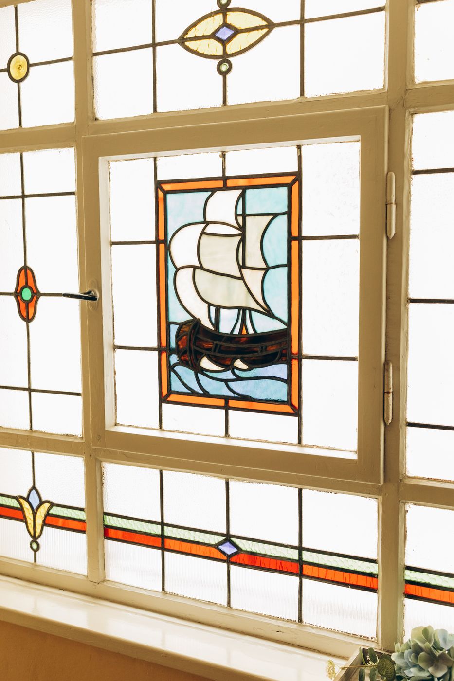 Stained-glass window with a sailing ship
